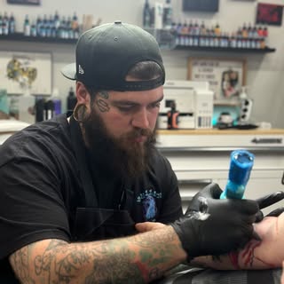 Marengo tattoo and piercing - Soundwave tattoo artist in Marengo, United States