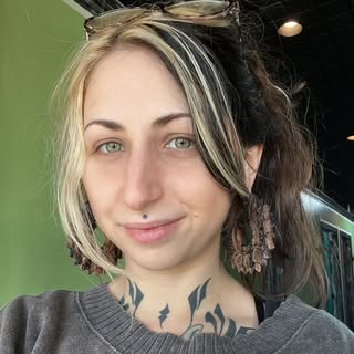 Michigan Tattoo Artist - Nadia Garver - Soundwave tattoo artist in Michigan, United States