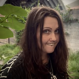 Olivia Scott - Kansas Tattoo Artist - Soundwave tattoo artist in Overland Park, United States