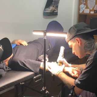 Purple monkey - Soundwave tattoo artist in Morris, United States