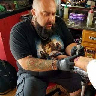 Red Dragon Tattoo Studio - Soundwave tattoo artist in Bronx, United States