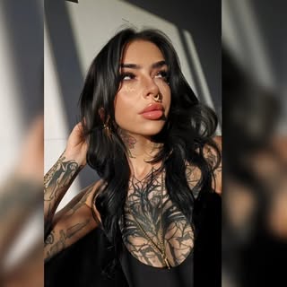 Sharla Comanescu - Soundwave tattoo artist in Niles, United States