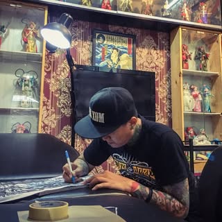 TranAnh - Soundwave tattoo artist in Dallas, United States