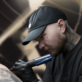 Yaroslav Kolomachenko - Soundwave tattoo artist in Toronto, Canada