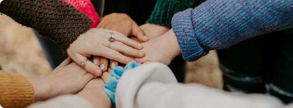 Community hands together