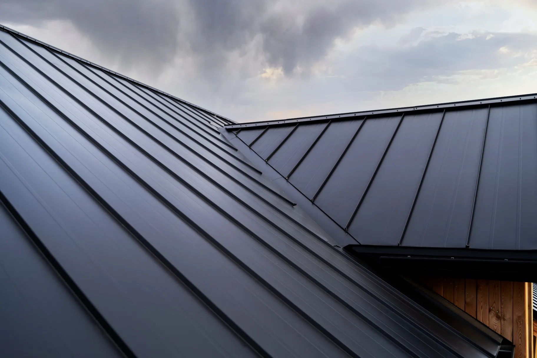 Low angle modern house with black metal roof