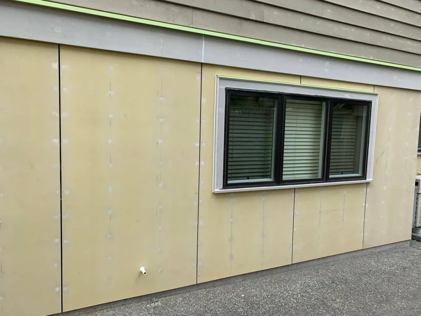 A stunning home exterior featuring newly installed, weatherproof siding by MES Exteriors Inc. — a premier, fully insured local siding contractor in Redmond, WA.