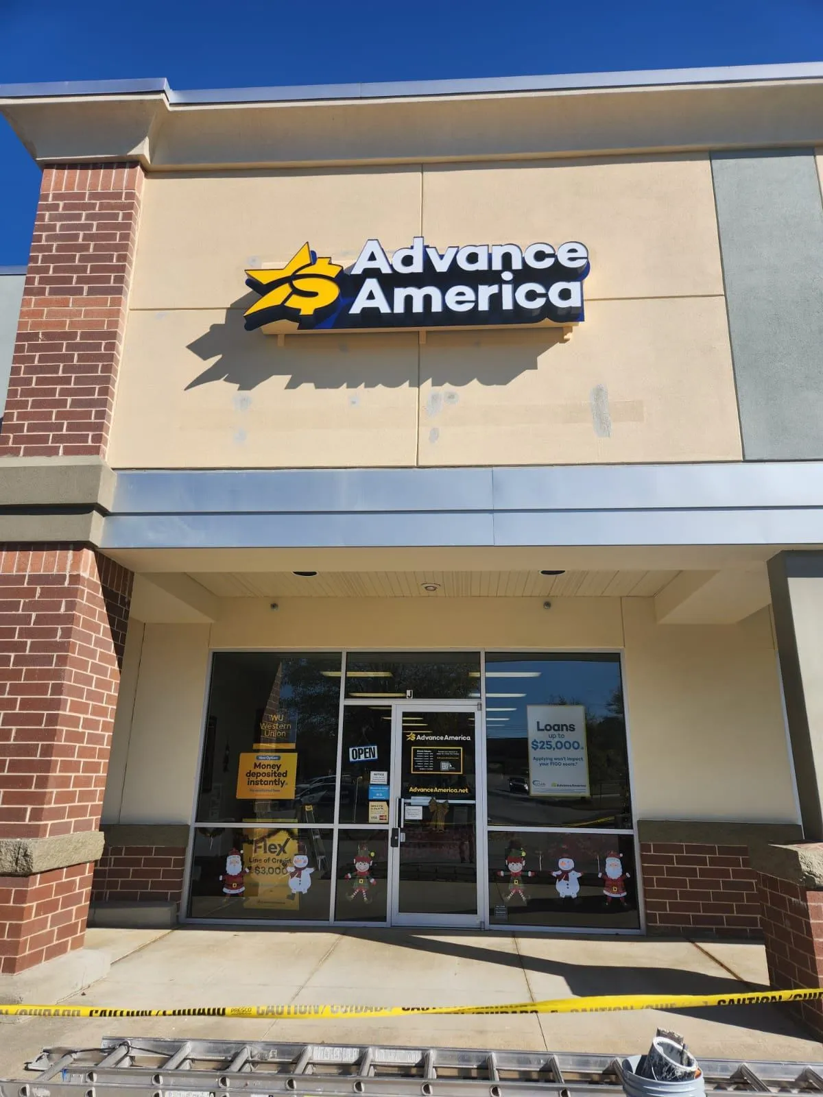 Exterior of an Advance America storefront with a freshly painted facade and professional sign installation, showcasing Hernández Painting & Renovations LLC’s commercial painting services.