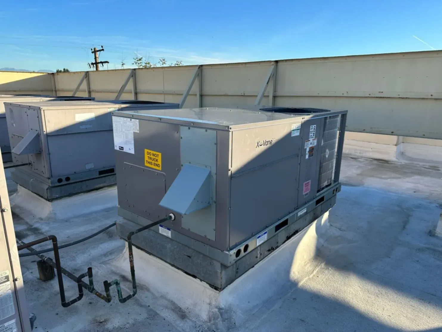 Rooftop HVAC units installed for premium cooling, showcasing AAC Heating and Air's expertise in commercial HVAC services.