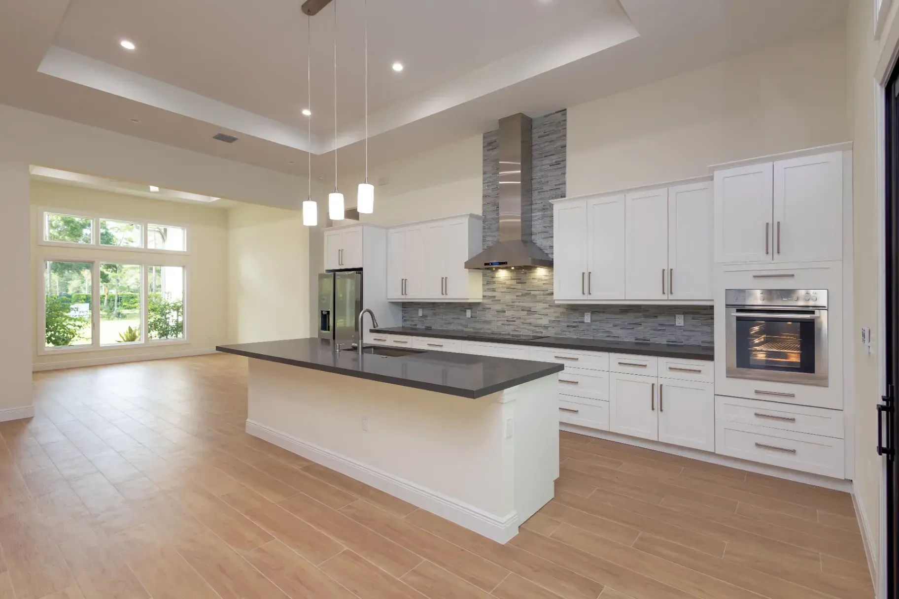 Backed by 23+ years of real architectural experience, Line Construction Inc. redesigns your house from front to back. We smoothly combine your kitchen, open living areas, bedrooms, and outdoor space into one beautiful, modern residence.