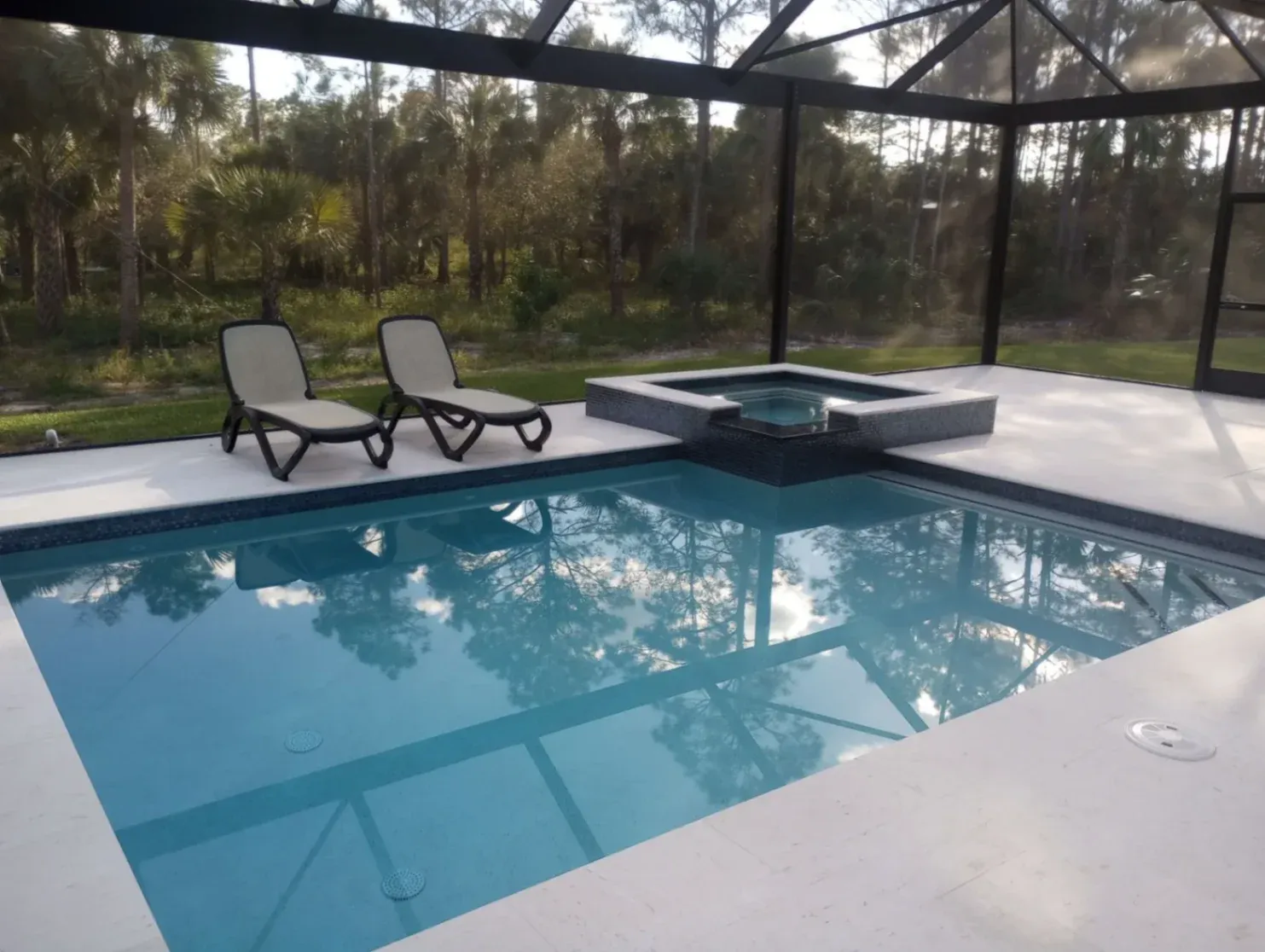 Transform Your Outdoors with Our Trusted Pool Builders in Estero, FL. Line Construction Inc. seamlessly integrates custom pool design and outdoor living spaces into your overall residential project.