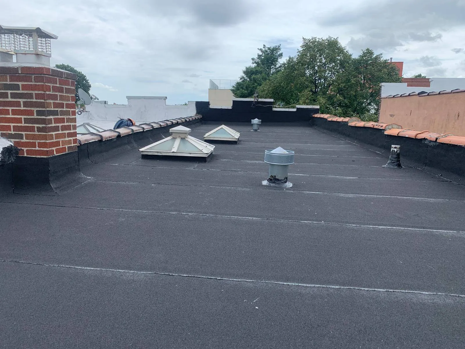 Commercial Flat Roofing: High-Performance Armor for Bronx Businesses