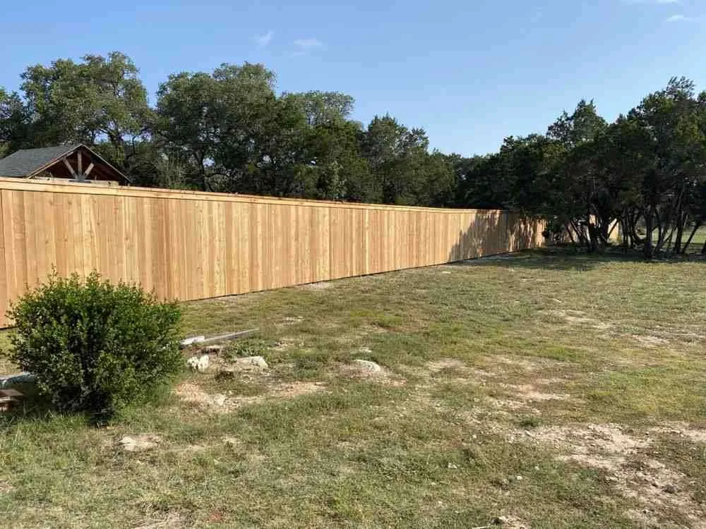 Wood fence professionally installed by Fence Builders with 14+ Years of Experience