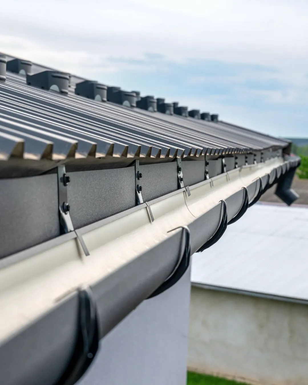 Reliable Gutter Services to Safely Channel Intense Storm Water Runoff