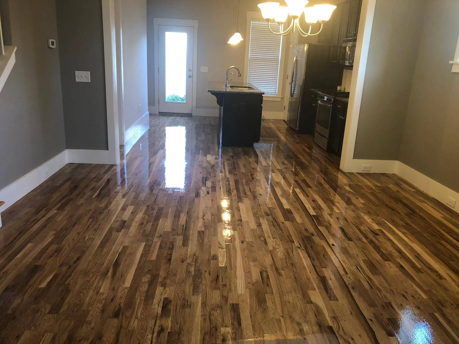 At DNH Hardwood Flooring, our specialized sand and finish process strips away years of wear and tear, revealing pristine, natural wood underneath.