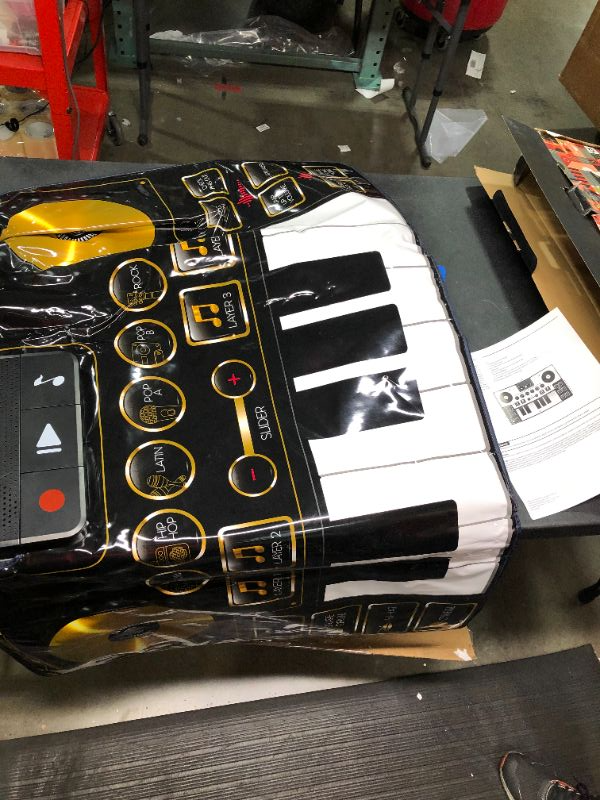 Photo 2 of FAO Schwarz Giant Electronic Dance Mat DJ Mixer with Piano Keyboard  Turntable Scratch Pads Includes Builtin Soundtracks  Vocal  Percussion Sound Effects for Composing  Recording Your Own Music