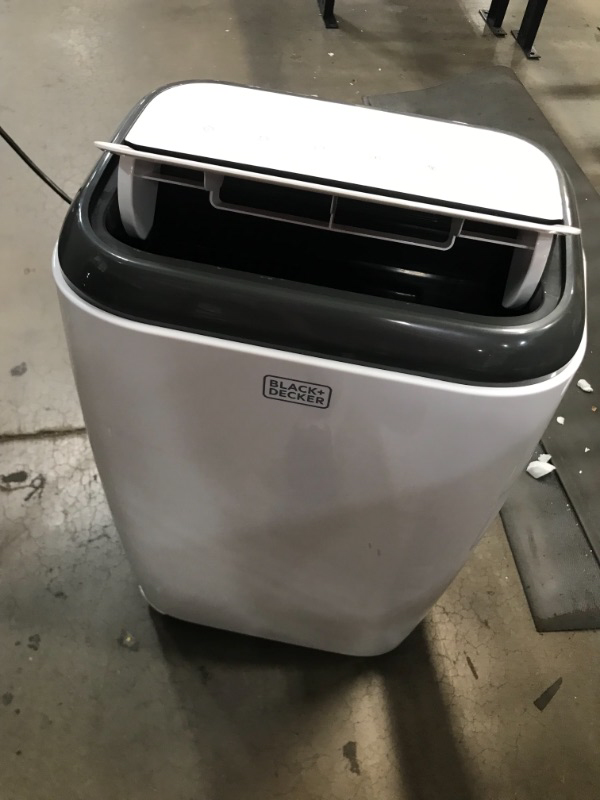 Photo 4 of BLACKDECKER BPP10WTB Portable Air Conditioner with Remote Control 10000 BTU SACCCEC 14000 BTU ASHRAE Cools Up to 450 Square Feet White

DOES NOT BLOW COLD AIR MISSING THE WINDOW KIT