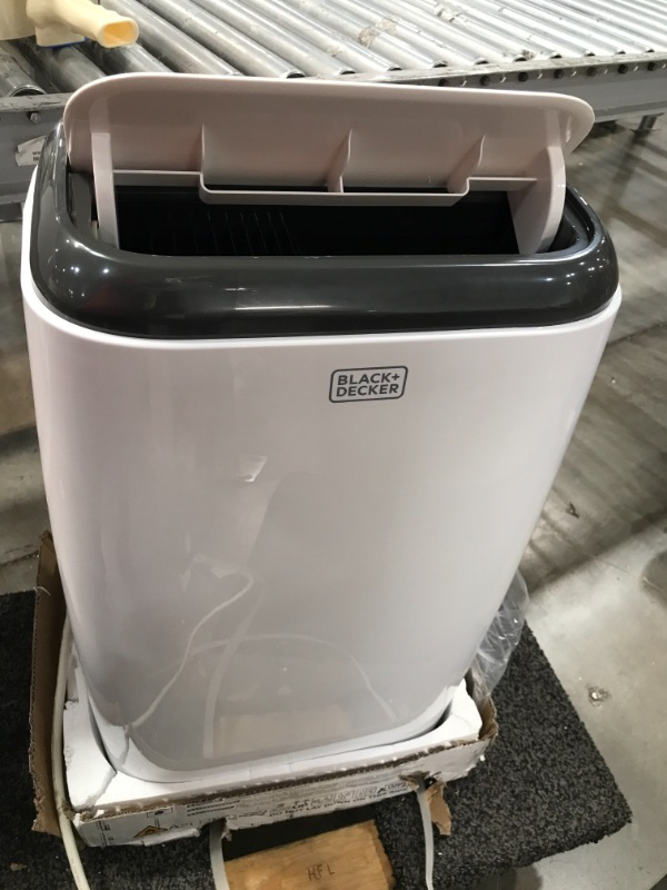 Photo 3 of BLACKDECKER BPP10WTB Portable Air Conditioner with Remote Control 10000 BTU SACCCEC 14000 BTU ASHRAE Cools Up to 450 Square Feet White

DOES NOT BLOW COLD AIR MISSING THE WINDOW KIT