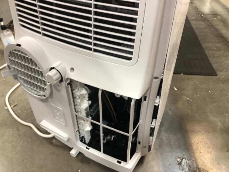 Photo 1 of Amazon Basics Portable Air Conditioner with Remote  Cools 450 Square Feet 10000 BTU ASHARE  6000 BTU SACC