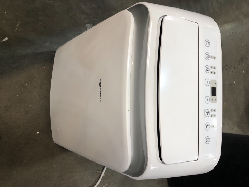 Photo 1 of Amazon Basics Portable Air Conditioner with Remote  Cools 450 Square Feet 10000 BTU ASHARE  6000 BTU SACC