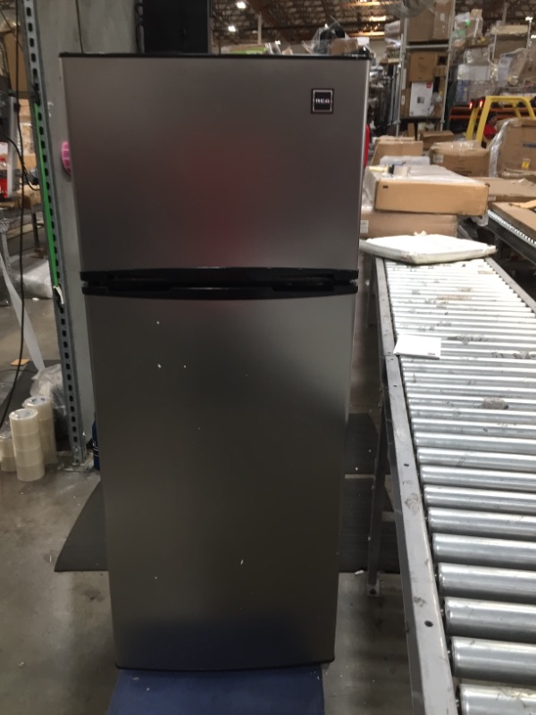 Photo 1 of 75 cu ft Refrigerator with Top Freezer in Stainless Look
DAMAGED CORNER DENTED
 NOT FUNCTIONAL NOT GETTING COLD