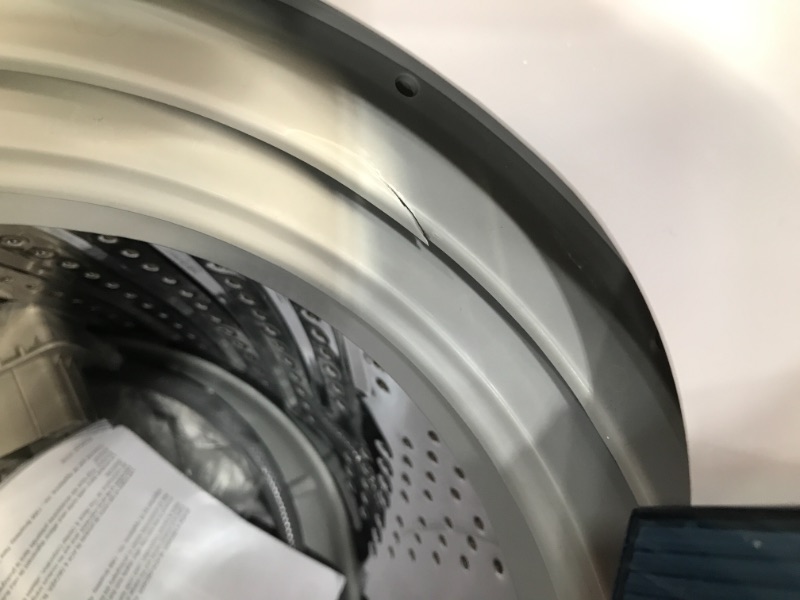 Photo 1 of BLACK  DECKER 09 cubic foot compact portable washer clothes washing machine White                              has a small crack in  the side plastic ring