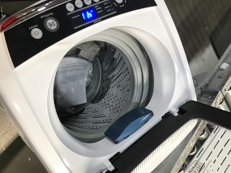 Photo 1 of BLACK  DECKER 09 cubic foot compact portable washer clothes washing machine White                              has a small crack in  the side plastic ring