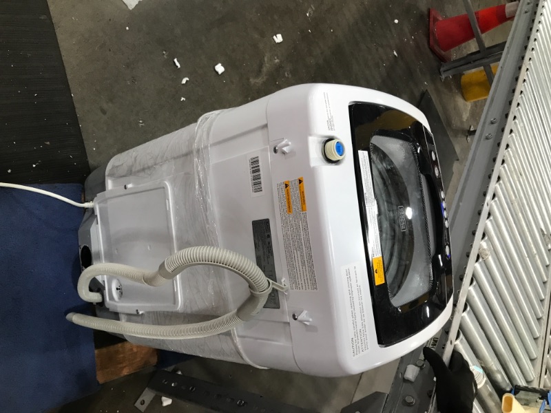 Photo 1 of BLACK  DECKER 09 cubic foot compact portable washer clothes washing machine White                              has a small crack in  the side plastic ring