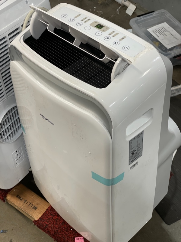 Photo 1 of Amazon Basics Portable Air Conditioner with Remote  Cools 550 square feet 14000 BTU