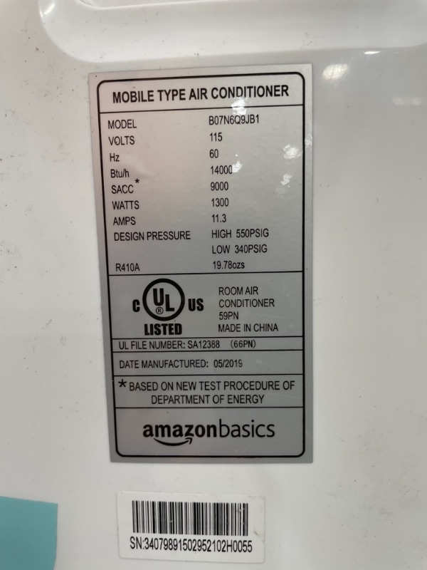 Photo 1 of Amazon Basics Portable Air Conditioner with Remote  Cools 550 square feet 14000 BTU