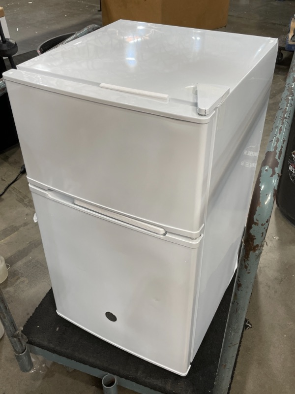 Photo 2 of GE 31 Cu Ft DoubleDoor Compact Refrigerator GDE03GGKWW White