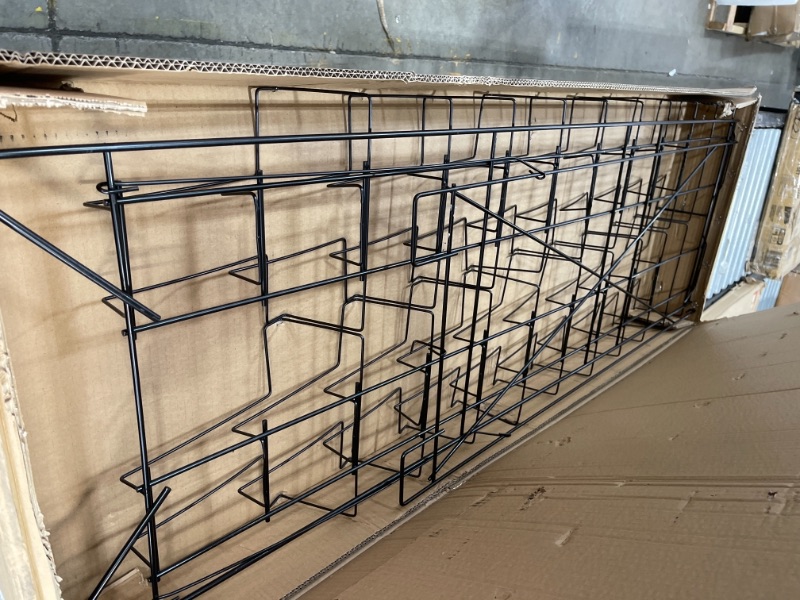 Photo 1 of Tiered Black Wire Magazine Rack 1914w x 2512d x 5112h Free Standing Floor Fixture with 20 Stacked Pockets Sign Slot