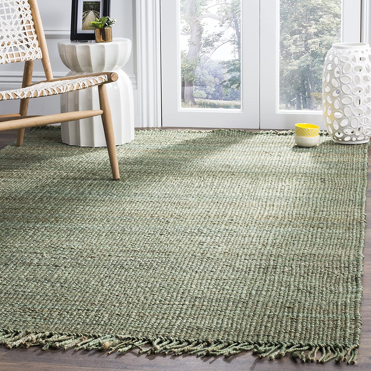 Photo 1 of Safavieh Natural Fiber Collection NF368G Handmade Boho Fringe Woven Jute Area Rug 5 x 8 Green