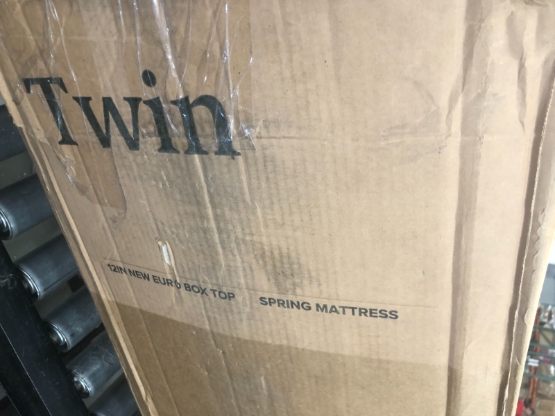 Photo 4 of MATTRESS ONLY
12 in Medium Euro Top Pocket Spring Twin Hybrid Mattress the seal already broken