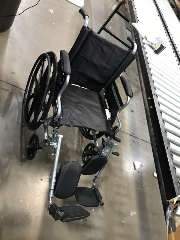 Photo 3 of Medline  MDS806550E Lightweight  UserFriendly Wheelchair With FlipBack DeskLength Arms  Elevating Leg Rests for Extra Comfort Black 18 Seat