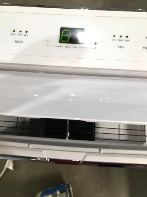 Photo 3 of GE Appliances 3in1 APCA12YZMW White GE Portable Air Conditioner with Dehumidifier for Medium Rooms up to 450 sq ft 12000 8200 BTU SACC 
USED COSMETIC DAMAGE TESTED PRODUCT PRODUCT TURNS ON  SETTINGS WORK