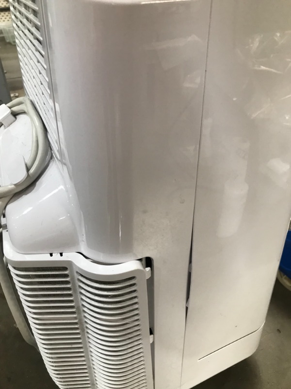 Photo 5 of GE Appliances 3in1 APCA12YZMW White GE Portable Air Conditioner with Dehumidifier for Medium Rooms up to 450 sq ft 12000 8200 BTU SACC 
USED COSMETIC DAMAGE TESTED PRODUCT PRODUCT TURNS ON  SETTINGS WORK