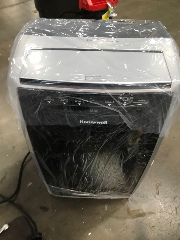 Photo 2 of Honeywell Classic Portable Air Conditioner with Dehumidifier  Fan Cools Rooms Up To 500 Sq Ft w Drain Pan  Insulation Tape BlackSilver MN1CFS8 29400 FACTORY NEW