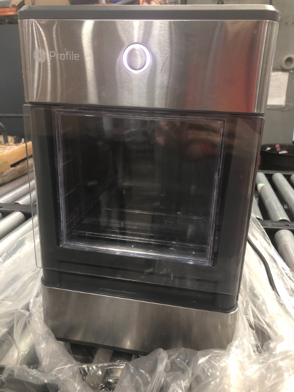 Photo 2 of GE Profile OPAL01GEPKT Opal  Countertop Nugget Ice Maker Stainless Steel Wrap with Gray Accents  LED Lighting

damaged
