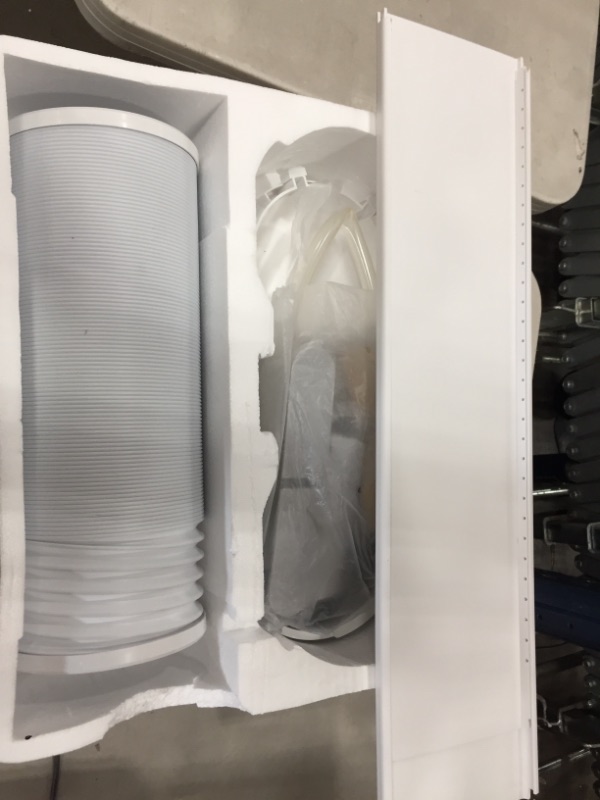 Photo 1 of Amazon Basics Portable Air Conditioner with Remote  Cools 550 Square Feet 12000 BTU ASHARE  8000 BTU SACC