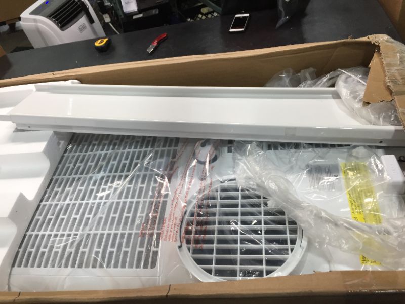 Photo 2 of Honeywell 10000 BTU Portable Air Conditioner with Dehumidifier in White