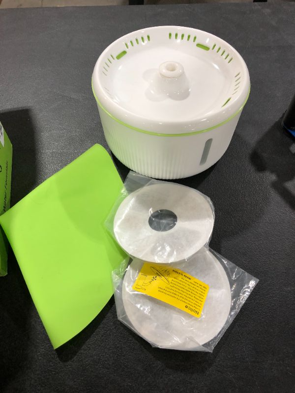 Photo 3 of EPICKA Sprout Pet Fountain 2L67oz Cat Water Fountain with LED Indicator Quiet Pump 3 TripleAction Filters and 1 Silicone Mat BPAFree Automatic Dog Water Dispenser