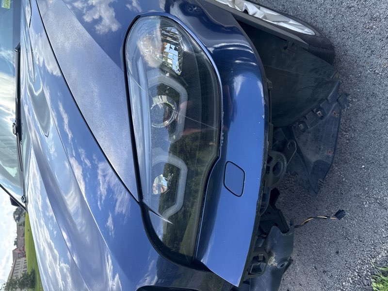 Used Headlight / Left for 2011 BMW X5 — photo 1