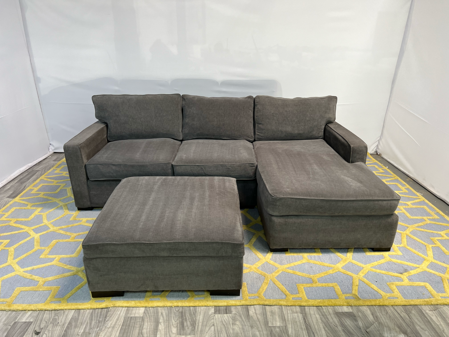 ( Delivery Available ) Macys Radley Dark Gray Sectional Couch with Storage Ottoman Image #1 | Ivy Store