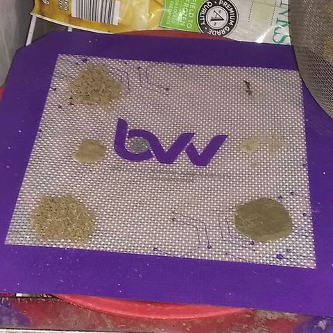 Dave's Sour Tangie growlog photo: Was very seedy from accidental early pollenation, but still very resinous.  Turned into bubble hash. Ended up with about 1.5 grams bubble hash, 1 gram FECO, 1.5 ounces of trim which was used for tincture and 1.5 ounces of seeds.