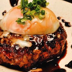Tsukune with a topping of egg.