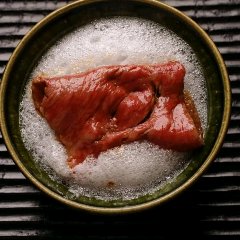 Omi beef sukiyaki with eggs whisked to a meringue-like consistency