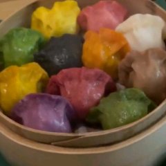 Colorful dumplings made with vegetables inside.