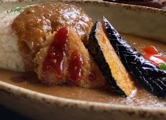 A blend of vegetables and ten different spices. Slowly simmered curry and rice