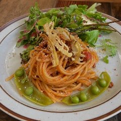 Pasta with rich and flavorful sauce from many vegetables in a big pot
